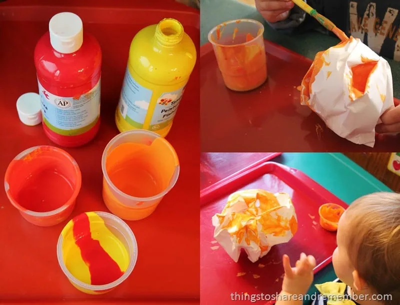 Painting Paper Pumpkins - orange paint