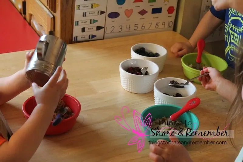 Preschoolers making their own oatmeal 