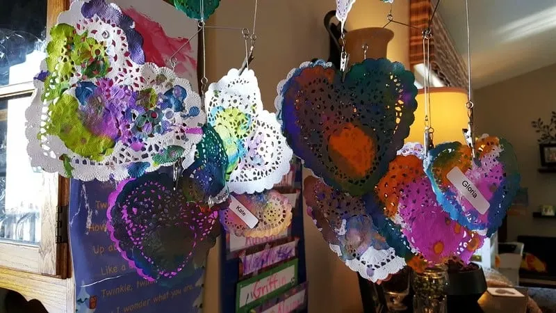 Valentine doily hearts painted with watercolors