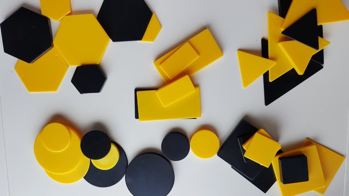 Attribute Blocks in Preschool sorting by shape