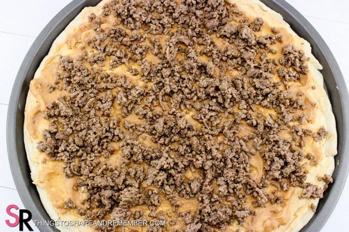 adding meat to Quick & Easy Taco Pizza