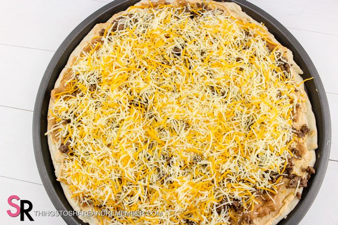 add cheese to Quick & Easy Taco Pizza