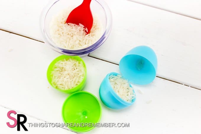filling plastic eggs with rice