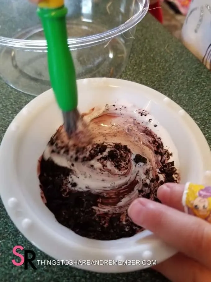 mixing paint and dirt
