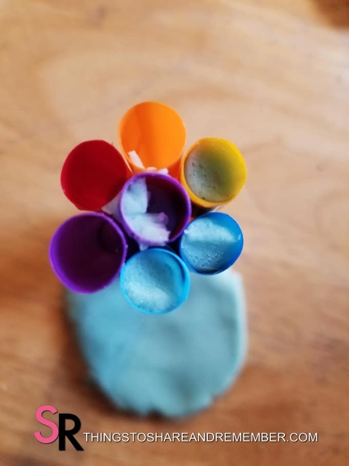 play dough stuck in end of straws