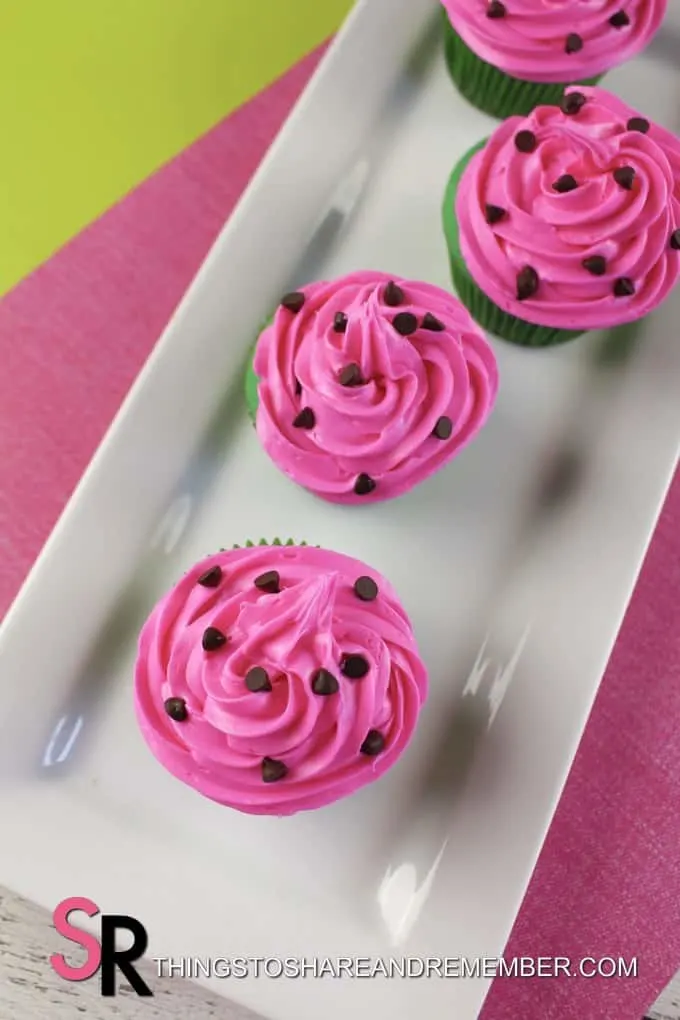 pink frosted cupcakes with mini chocolate chips