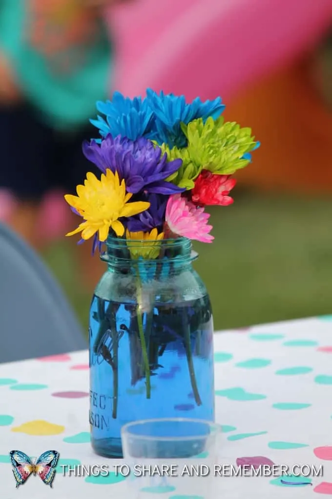colorful flowers in vases garden party