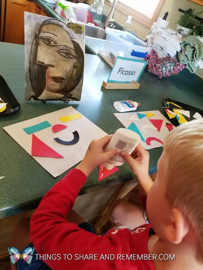 gluing shapes on paper in preschool Picasso in Preschool