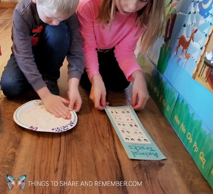 Making fingerprints in play dough or animal tracks in the snow #MGTblogger #MotherGooseTime #preschool #SightsandSounds #preschoolcurriculum