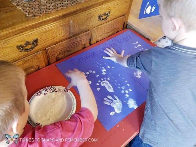 Community Challenge for preschool: making fingerprints or handprints group activity for preschool - goes with the theme Sights and Sounds of Winter from Mother Goose Time  #MGTblogger #MotherGooseTime #preschool #SightsandSounds 