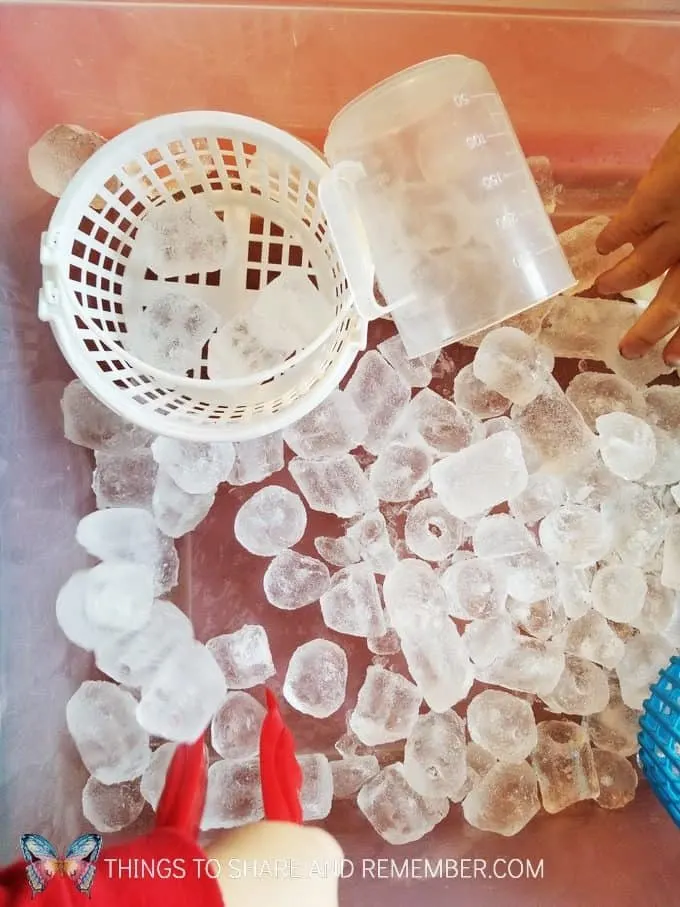 Ice sensory bin for winter ice preschool theme. #MotherGooseTime #MGTblogger #SightsandSounds #sensorybin