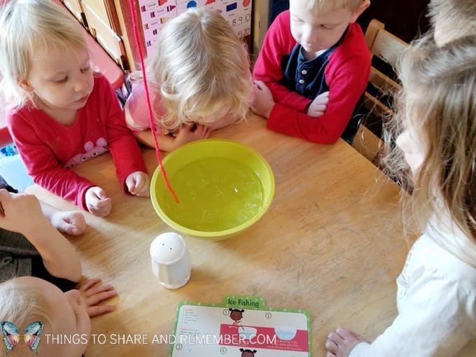 ice fishing science experiment for preschoolers involving ice freezing and melting #SightsandSounds #MotherGooseTime #MGTblogger