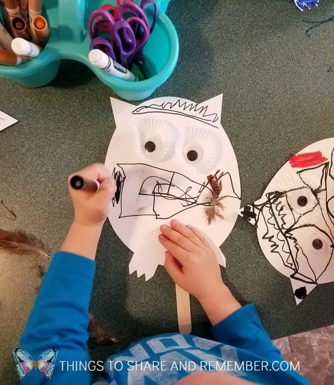 Coloring an owl puppet Make and Play craft activity for preschoolers #MakeandPlay #MotherGooseTime #preschool #familychildcare #MGTblogger