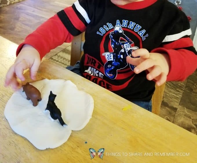 Animal tracks in the snow play dough sensory play with animals and play dough #MGTblogger #MotherGooseTime #preschool #sensory #playdough #SightsandSounds