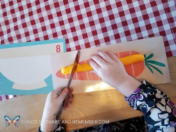 slicing play dough carrots kitchen theme activity for preschoolers Slice and Count Play Dough Math Activity