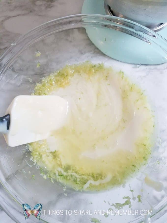 stirring in sweetened condensed milk to key lime pie ice cream 