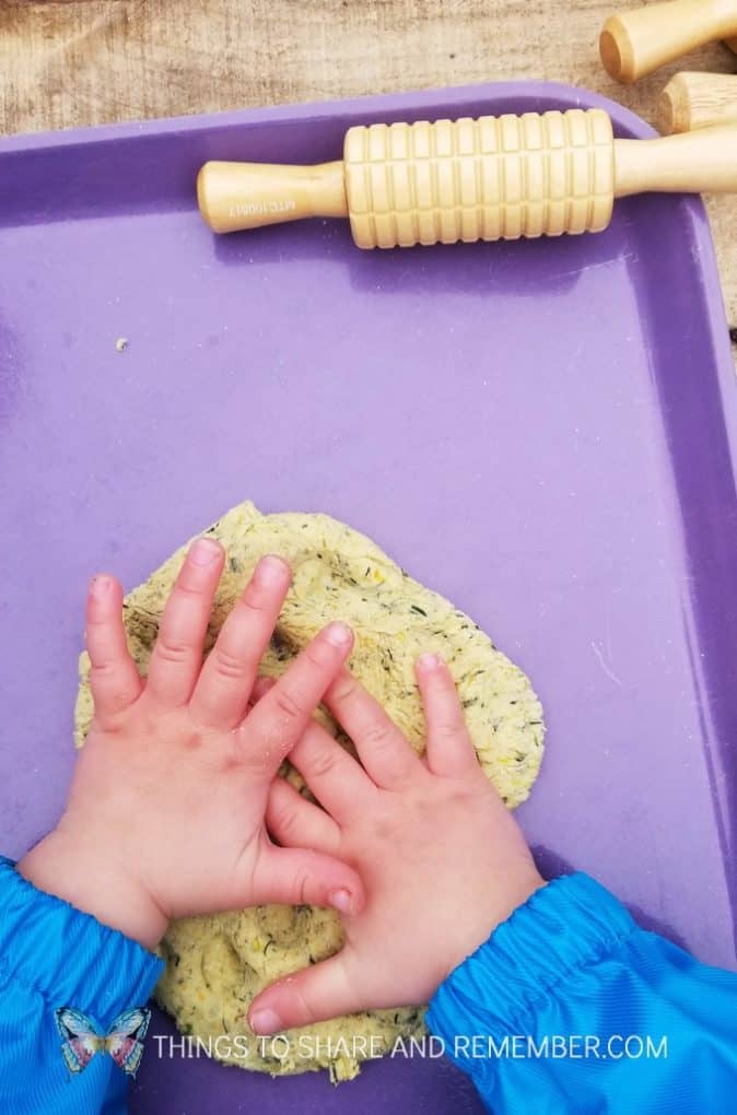 little hands with dandelion play dough