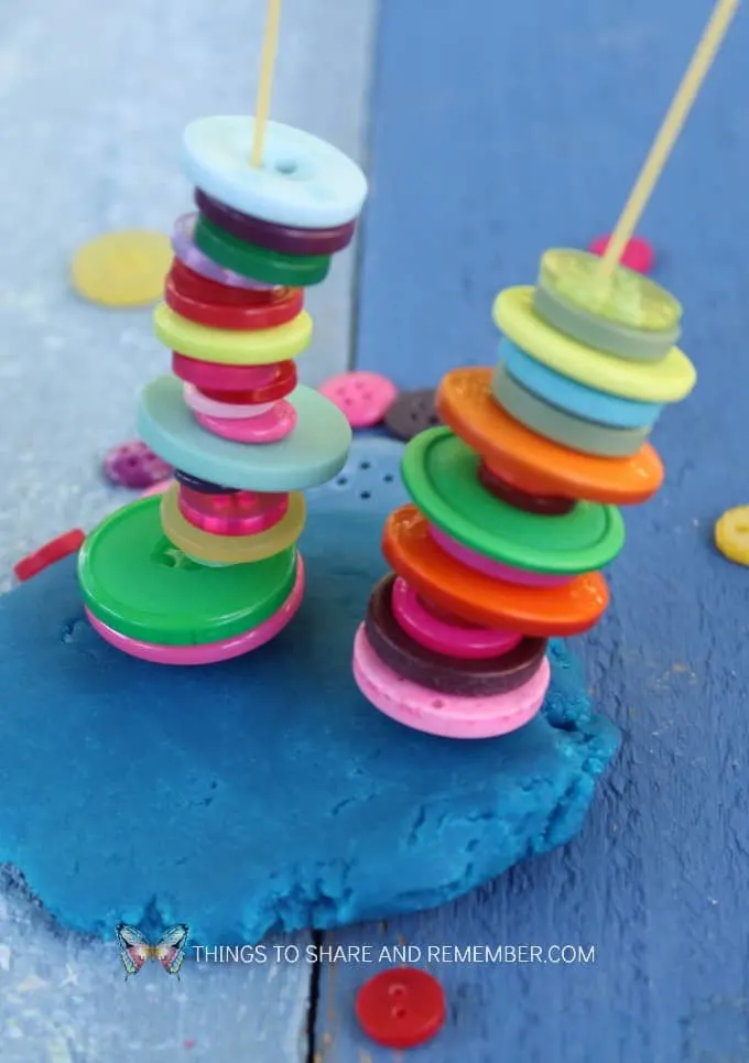 button towers stacking buttons