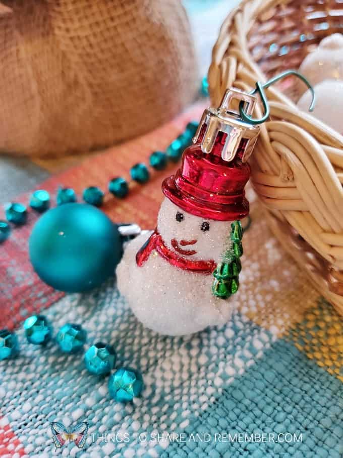 decorating the Christmas tree dramatic play snowman ornament