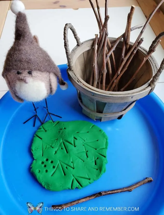 Tray with bird, basket of sticks and play dough  Birds & Eggs theme