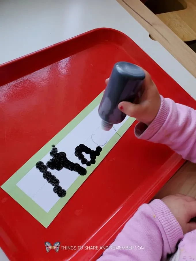 painting letters with a bingo painter
