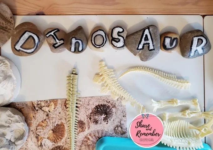 dinosaur spelled with letter rocks Dinosaur Fossils Crafts & Activities for Preschoolers